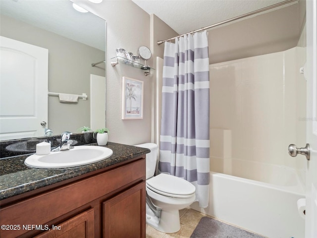 full bathroom featuring toilet, a textured ceiling, vanity, shower / bath combo with shower curtain, and tile patterned flooring