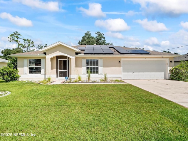 single story home featuring a garage and a front lawn