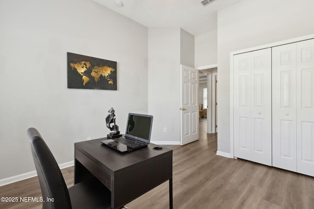 office featuring hardwood / wood-style floors