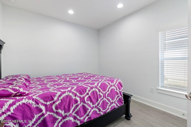 bedroom with wood-type flooring