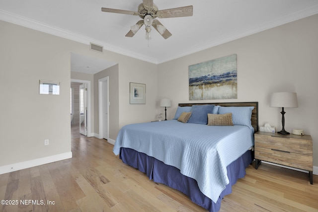 bedroom featuring crown molding, ceiling fan, and light hardwood / wood-style flooring