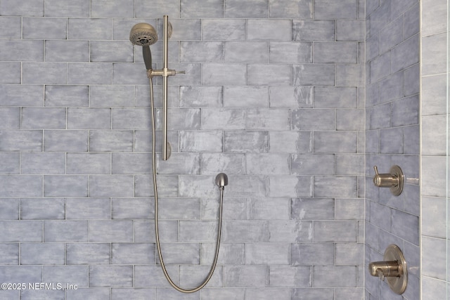 details featuring a tile shower