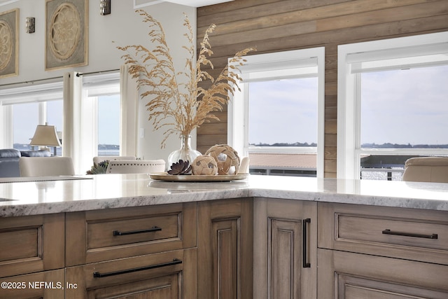 room details featuring light stone countertops