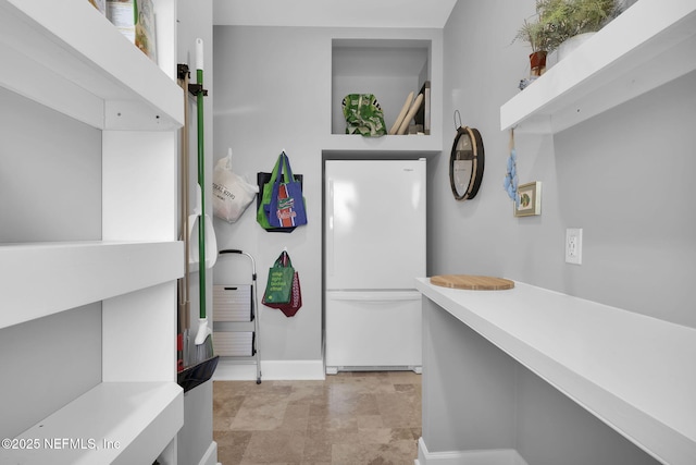 interior space with white refrigerator