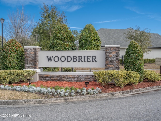 view of community sign