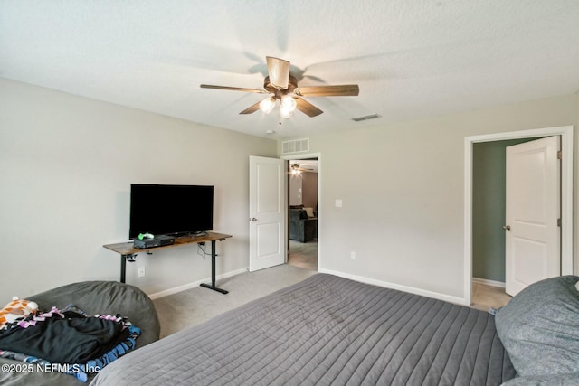 bedroom with light carpet and ceiling fan