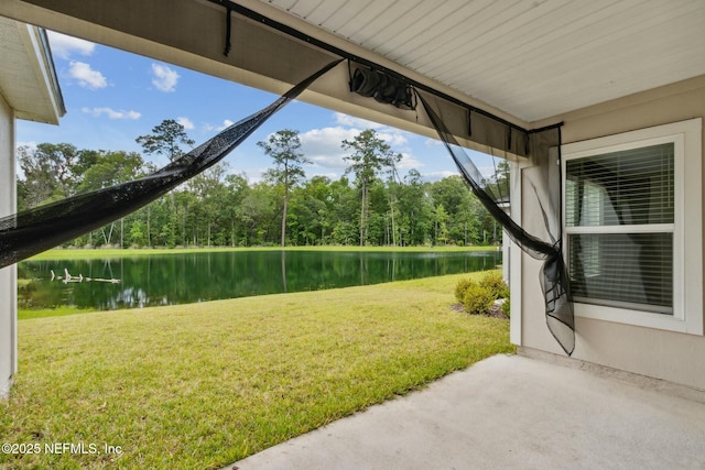 exterior space with a water view