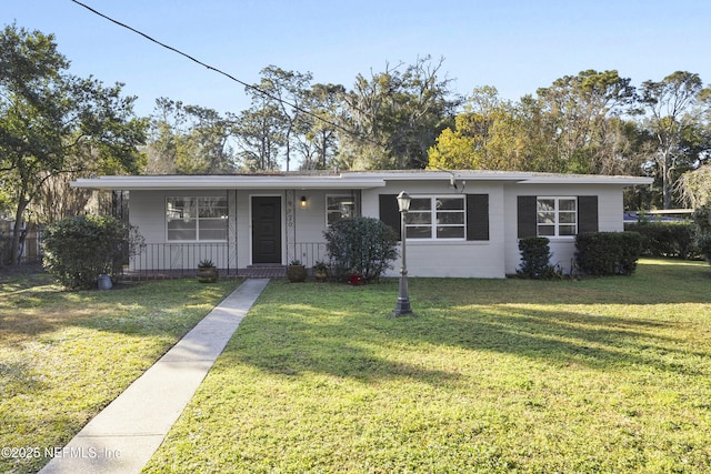 ranch-style home with a porch and a front lawn