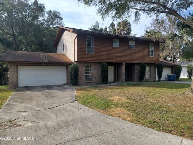 view of front facade with a garage and a front yard