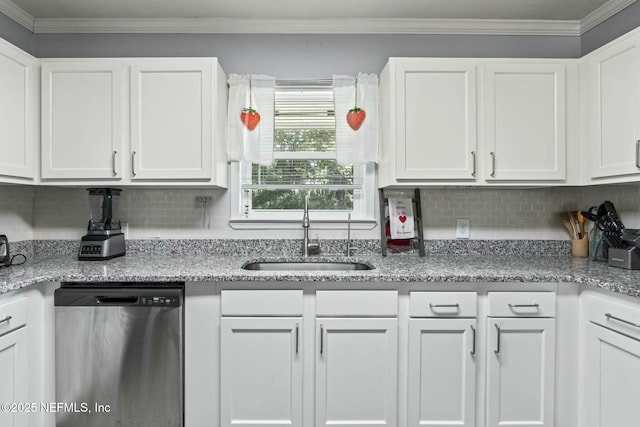 kitchen featuring sink, crown molding, backsplash, white cabinets, and stainless steel dishwasher