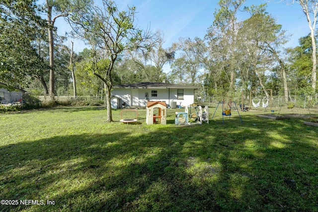 view of yard with a playground