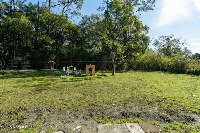 view of yard with a playground