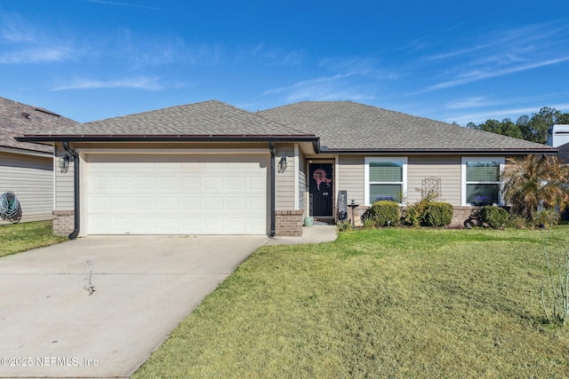 ranch-style home featuring a garage and a front lawn