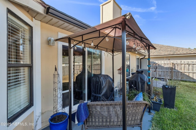 view of patio featuring a gazebo and grilling area