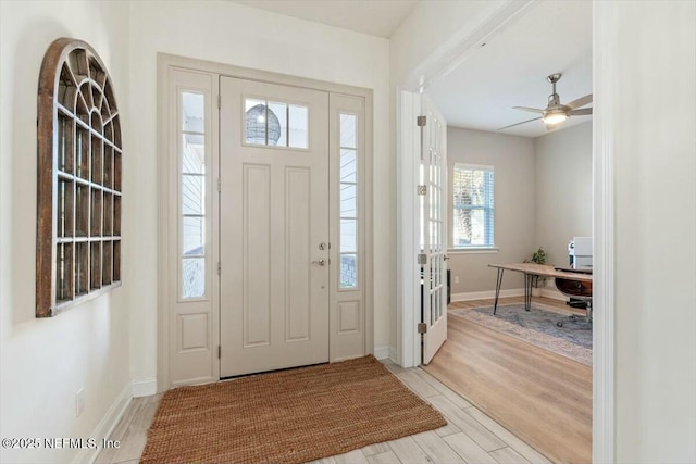 entrance foyer with light hardwood / wood-style flooring