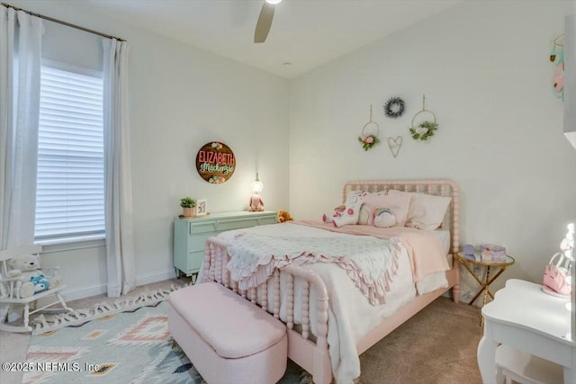 bedroom featuring ceiling fan and light colored carpet