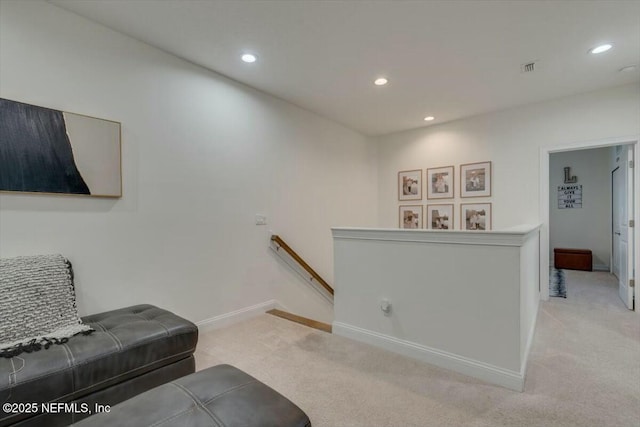 living room featuring light carpet