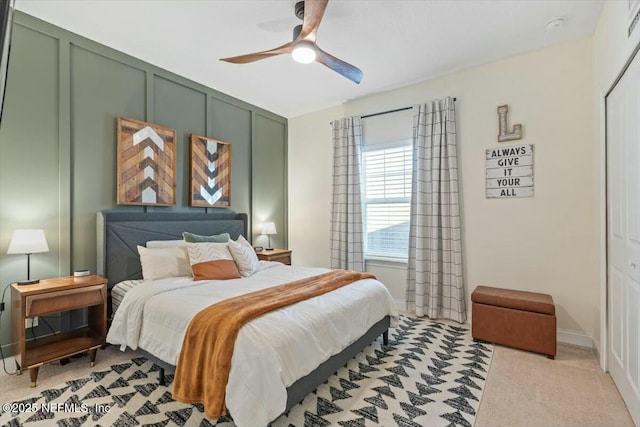 carpeted bedroom featuring ceiling fan