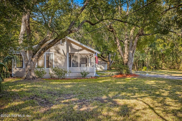 view of front of home with a front yard