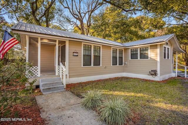 view of front of property with a front lawn