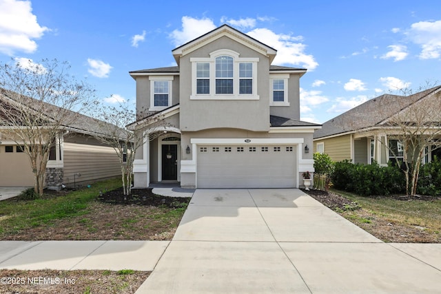 view of property featuring a garage