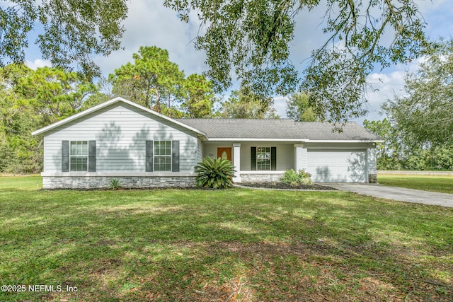 ranch-style house with a garage and a front lawn