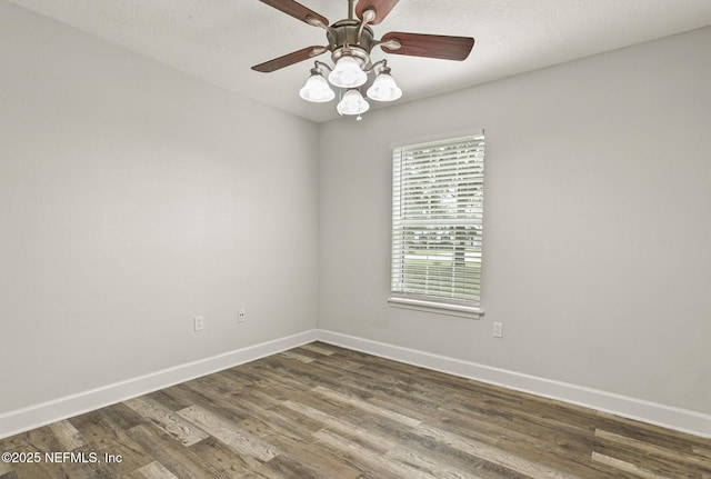 spare room with hardwood / wood-style flooring, ceiling fan, and a textured ceiling