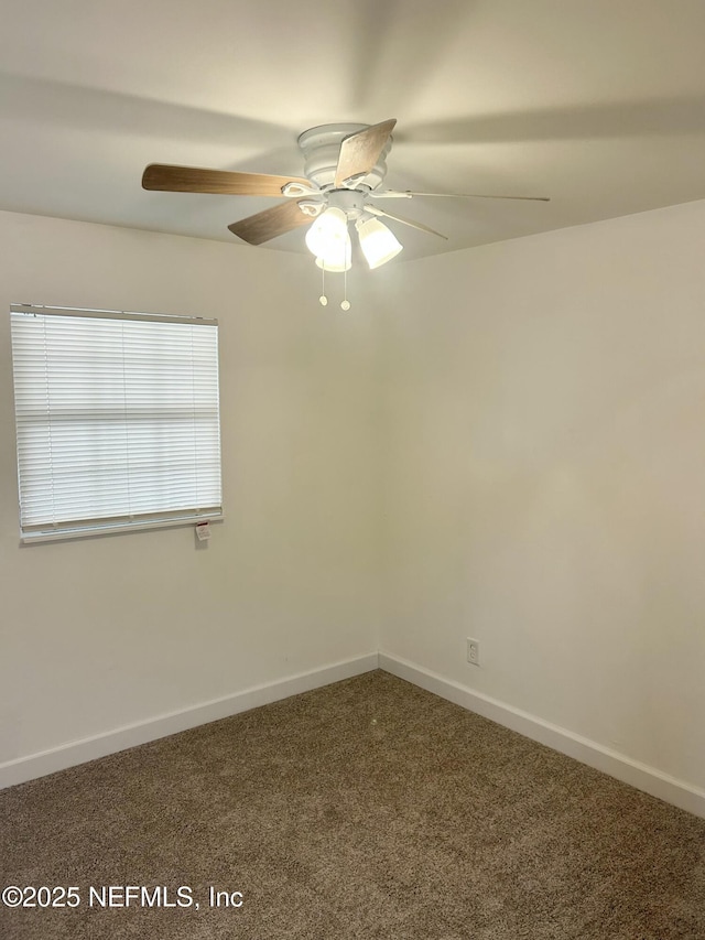 unfurnished room featuring carpet floors and ceiling fan