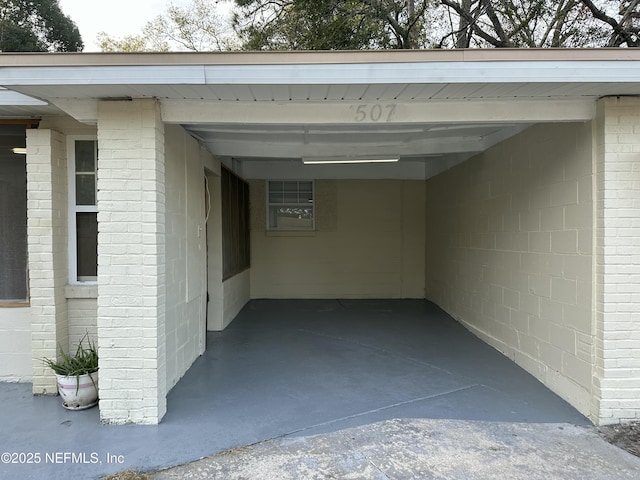 view of parking with a carport