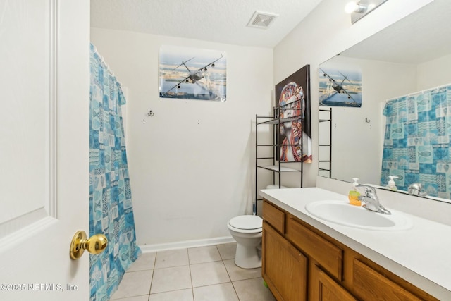 bathroom with vanity, toilet, tile patterned floors, a textured ceiling, and a shower with shower curtain