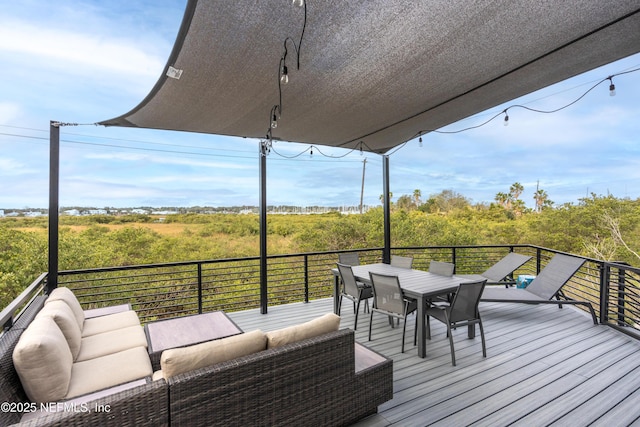 deck with an outdoor living space