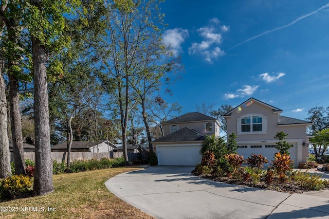 view of front of home with a garage