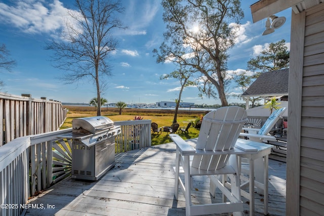 wooden terrace with grilling area