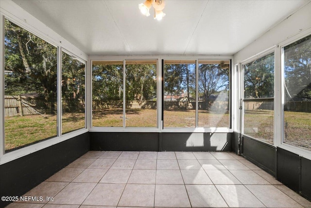 unfurnished sunroom featuring plenty of natural light