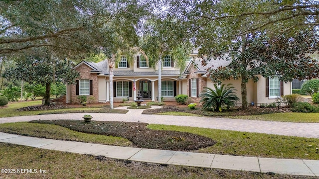 view of front of home with a front yard