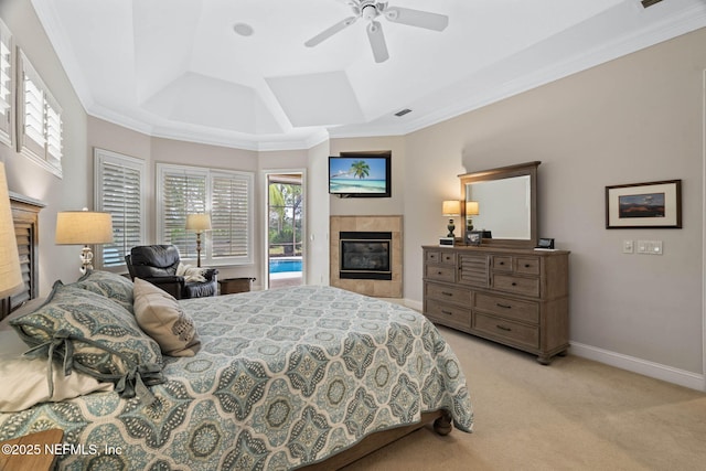 carpeted bedroom featuring crown molding, ceiling fan, a fireplace, and access to exterior