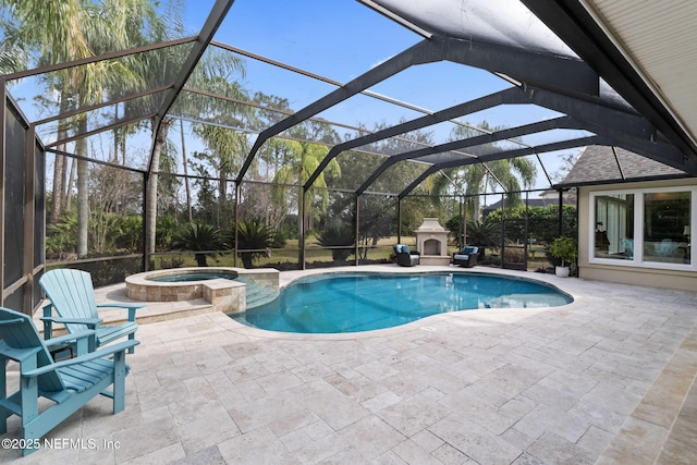 view of swimming pool featuring an in ground hot tub, a lanai, and a patio area