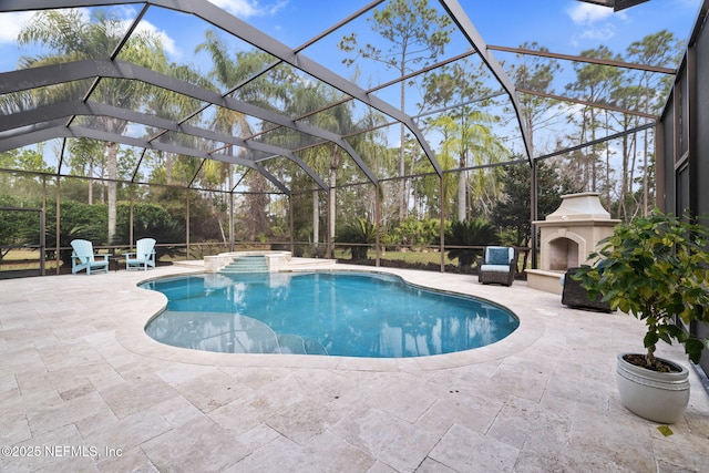 view of swimming pool featuring a fireplace, a patio, and glass enclosure