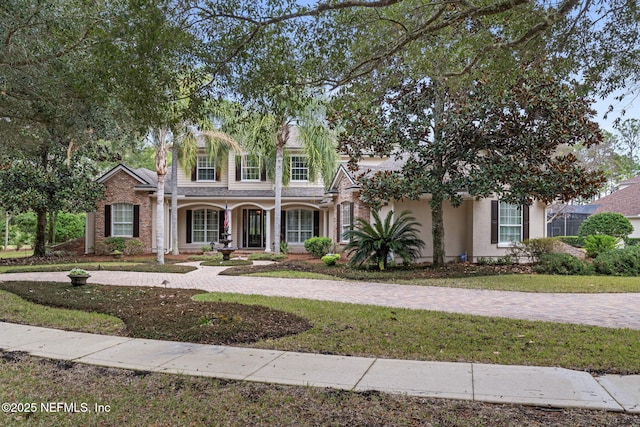 view of front facade with a front yard