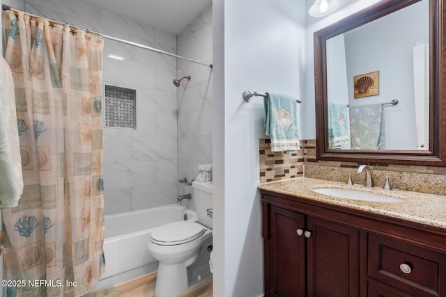 full bathroom with vanity, toilet, and shower / bath combo