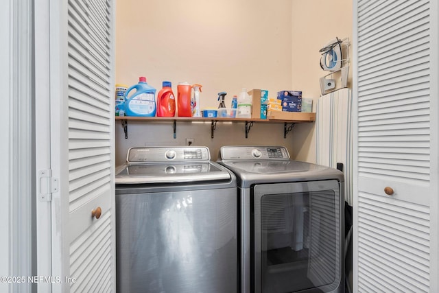 clothes washing area with independent washer and dryer