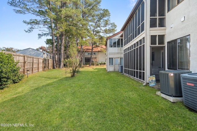 view of yard with central AC