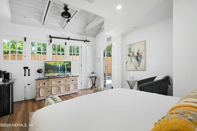 bedroom with vaulted ceiling with beams, wood ceiling, and dark hardwood / wood-style flooring