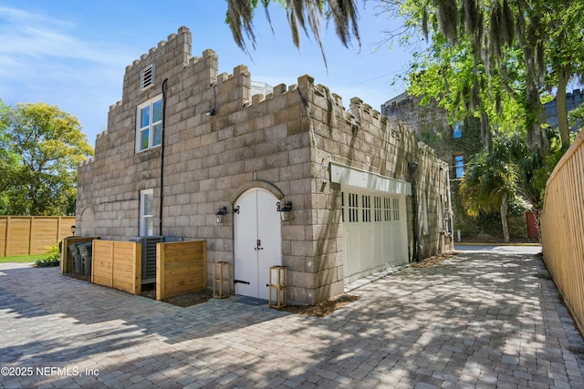 view of outbuilding featuring a garage