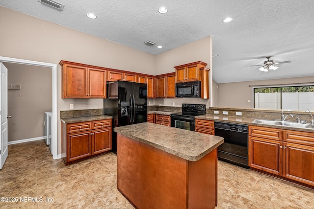 kitchen with vaulted ceiling, a kitchen island, sink, ceiling fan, and black appliances