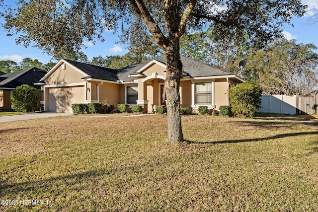 ranch-style house featuring a garage and a front lawn