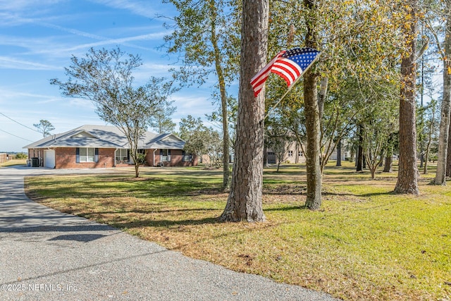 exterior space with a front yard