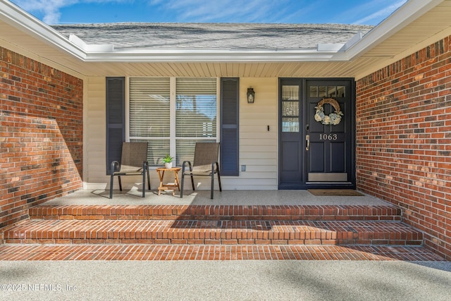 entrance to property with covered porch