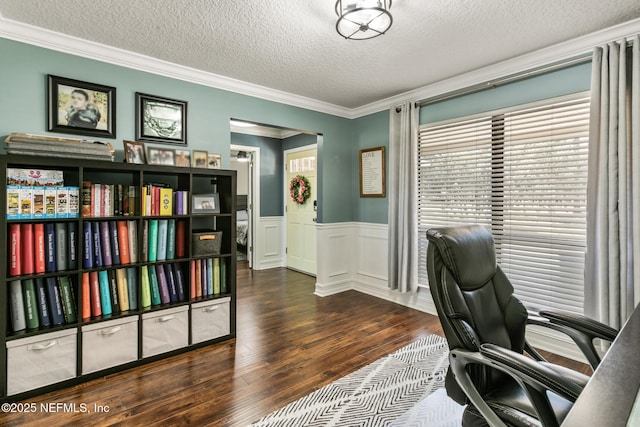 office area featuring ornamental molding, dark wood-type flooring, and a textured ceiling