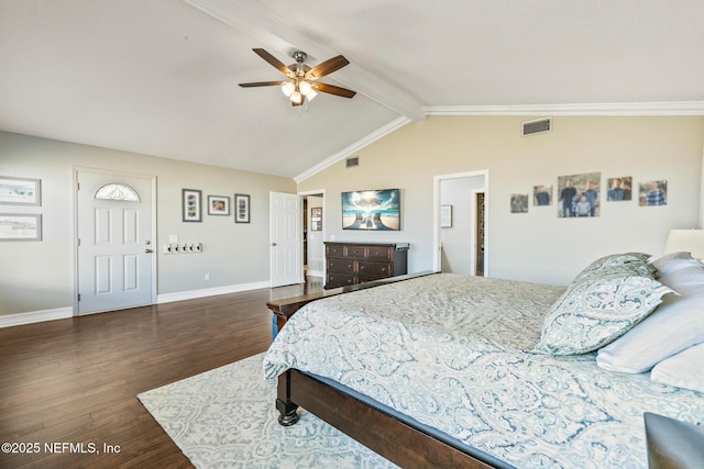 bedroom featuring ceiling fan, dark hardwood / wood-style flooring, and lofted ceiling with beams